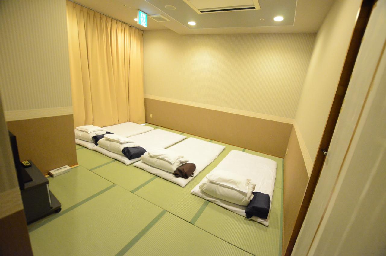 Kumamoto Capsule Hotel Exteriör bild